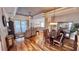Bright dining room with hardwood floors and a large table at 8773 Stone Harbour Loop, Bradenton, FL 34212