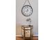 Elegant end table with a lamp and clock at 8773 Stone Harbour Loop, Bradenton, FL 34212