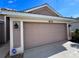 Two-car garage with ADT security system at 8773 Stone Harbour Loop, Bradenton, FL 34212
