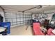 Garage with bikes, storage, and a large door at 8773 Stone Harbour Loop, Bradenton, FL 34212