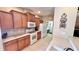Kitchen boasts ample cabinetry, and appliances at 8773 Stone Harbour Loop, Bradenton, FL 34212