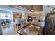 Open living area with hardwood floors and access to kitchen at 8773 Stone Harbour Loop, Bradenton, FL 34212