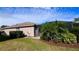 Rear of house with pool and screened enclosure at 8773 Stone Harbour Loop, Bradenton, FL 34212
