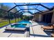 Large screened-in pool and spa with plenty of space to relax at 8773 Stone Harbour Loop, Bradenton, FL 34212