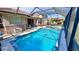 Refreshing pool and spa with a screened enclosure, perfect for relaxation at 8773 Stone Harbour Loop, Bradenton, FL 34212
