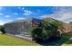 Private screened pool and spa with lush landscaping at 8773 Stone Harbour Loop, Bradenton, FL 34212