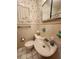 Retro bathroom with single sink vanity, toilet and shower at 975 S Tuttle Ave, Sarasota, FL 34237