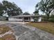 Charming single story home with attached two-car garage at 975 S Tuttle Ave, Sarasota, FL 34237