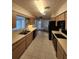 Open concept kitchen with views into the living room at 975 S Tuttle Ave, Sarasota, FL 34237