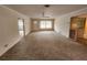 Spacious living room with wall-to-wall carpeting and large windows at 975 S Tuttle Ave, Sarasota, FL 34237