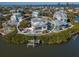 Two-story house, private pool, and lush landscaping at 114 Gull Dr, Anna Maria, FL 34216