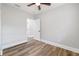 Bedroom with ceiling fan and door to another room at 1010 E Lake Ave, Tampa, FL 33605