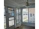 Sunroom with ample windows and access to outdoors at 10315 Cortez W Rd # 6Wp, Bradenton, FL 34210