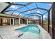 Enclosed pool and spa with covered patio at 10508 Mcalester Cir, Port Charlotte, FL 33981