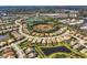 Aerial view of large community with lake at 11241 Sandhill Preserve Dr, Sarasota, FL 34238