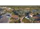 Aerial view of community tennis courts and homes at 11241 Sandhill Preserve Dr, Sarasota, FL 34238