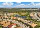 Aerial view of community with lake and homes at 11241 Sandhill Preserve Dr, Sarasota, FL 34238