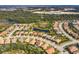 Aerial view of houses and roads in a neighborhood at 11241 Sandhill Preserve Dr, Sarasota, FL 34238