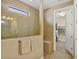 Bathroom with walk-in shower and built-in bench at 11241 Sandhill Preserve Dr, Sarasota, FL 34238