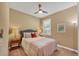 Charming bedroom with window shutters and soft color scheme at 11241 Sandhill Preserve Dr, Sarasota, FL 34238