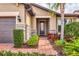 Front entry with brick pavers and landscaping at 11241 Sandhill Preserve Dr, Sarasota, FL 34238