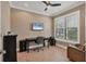 Home office with large window and built-in desk at 11241 Sandhill Preserve Dr, Sarasota, FL 34238