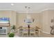 Bright dining room with table and chairs at 11808 Sawgrass Lake Ter, Bradenton, FL 34211