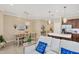 Casual dining area with table and chairs near kitchen at 11808 Sawgrass Lake Ter, Bradenton, FL 34211