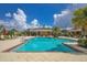 Resort-style pool with cabana and seating at 11808 Sawgrass Lake Ter, Bradenton, FL 34211