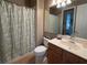 Clean bathroom with shower/tub combo, vanity, and tile floor at 1274 Burgos Dr # 1101, Sarasota, FL 34238