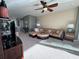 Spacious living room with comfortable seating and a TV at 1274 Burgos Dr # 1101, Sarasota, FL 34238