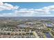 Aerial view of community with lake and homes at 12985 Bliss Loop, Bradenton, FL 34211