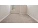 Bright bedroom with neutral walls and carpet at 12985 Bliss Loop, Bradenton, FL 34211