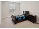 Simple bedroom with a twin bed and a dresser at 12985 Bliss Loop, Bradenton, FL 34211