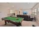 Entertain in this game room with pool table and sectional at 12985 Bliss Loop, Bradenton, FL 34211