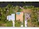 Aerial view of a single-Gathering home near a canal, offering a peaceful setting at 1313 Harbor Blvd, Port Charlotte, FL 33952