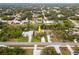 High-angle view of the property and surrounding neighborhood, highlighting canal proximity at 1313 Harbor Blvd, Port Charlotte, FL 33952