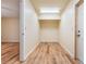 Empty basement room with wood-look floors at 1313 Harbor Blvd, Port Charlotte, FL 33952