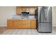 View of kitchen with stainless steel refrigerator at 1313 Harbor Blvd, Port Charlotte, FL 33952