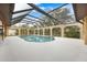 Enjoy this private pool and screened enclosure perfect for relaxation at 1313 Harbor Blvd, Port Charlotte, FL 33952