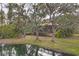 House with backyard access to a peaceful pond at 135 N Creek Ln, Osprey, FL 34229