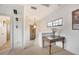 Elegant upstairs hallway with built-in desk and bathroom access at 135 N Creek Ln, Osprey, FL 34229