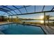 Refreshing pool and screened enclosure with lake views at 15009 18Th E Run, Parrish, FL 34219