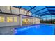 Enjoy evenings in this beautiful pool and patio area with a covered lanai at 15009 18Th E Run, Parrish, FL 34219