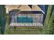 Aerial view of a home with a screened in pool at 15009 18Th E Run, Parrish, FL 34219