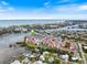 Aerial view of waterfront property and surrounding neighborhood at 1604 Stickney Point Rd # 102, Sarasota, FL 34231