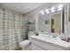 Clean bathroom with a shower/tub combo and vanity at 1604 Stickney Point Rd # 102, Sarasota, FL 34231