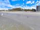 Relax on the pristine sandy beach with ocean views at 1604 Stickney Point Rd # 102, Sarasota, FL 34231