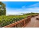 Scenic boardwalk path offering tranquil waterfront views at 1604 Stickney Point Rd # 102, Sarasota, FL 34231