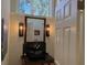 Modern powder room with dark vanity and elegant lighting fixtures at 1666 Pintail Way # 9, Sarasota, FL 34231